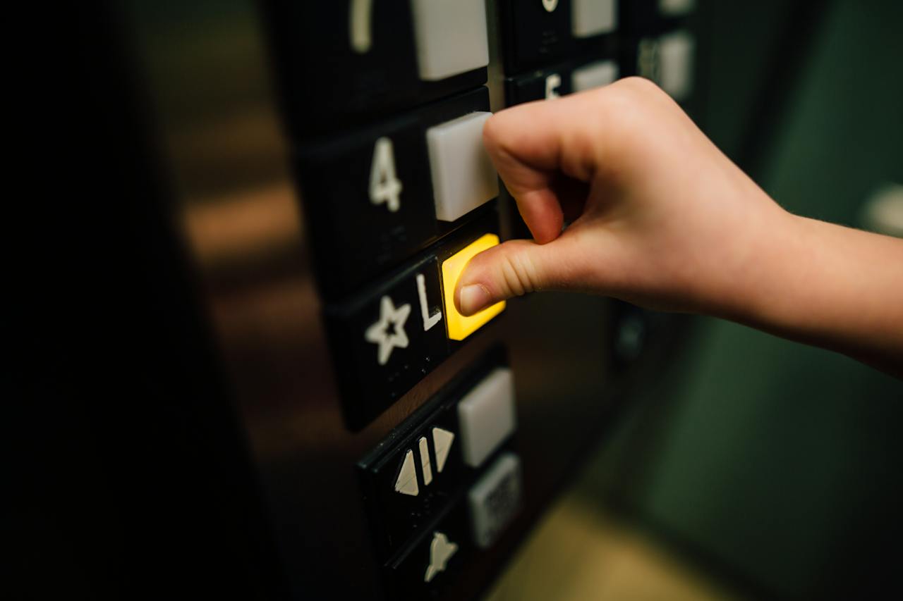 pushing an elevator button
